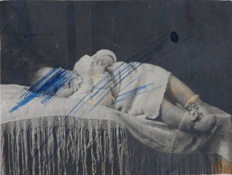 Collecting old photographs from family members for restoration